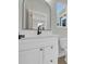 Bathroom with a white vanity, a sink, mirror and toilet at 373 St. Julian Ln., Myrtle Beach, SC 29579