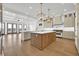 Spacious, open-concept kitchen features a center island, stainless steel appliances, and abundant natural light at 373 St. Julian Ln., Myrtle Beach, SC 29579