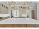 Spacious kitchen with an extended island, premium appliances, custom cabinets and modern, unique lighting at 373 St. Julian Ln., Myrtle Beach, SC 29579