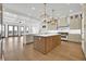 Spacious kitchen featuring white countertops, a large center island, and stainless-steel appliances at 373 St. Julian Ln., Myrtle Beach, SC 29579