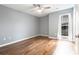 Bright bedroom featuring a ceiling fan, luxury vinyl floors, and natural light at 3792 Hitchcock Way # 213, Myrtle Beach, SC 29577