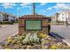 Beautiful brick community entrance sign surrounded by colorful flower beds on a bright sunny day at 3792 Hitchcock Way # 213, Myrtle Beach, SC 29577