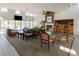 Inviting lounge area featuring a brick fireplace, tall ceilings, and a cozy seating arrangement at 3792 Hitchcock Way # 213, Myrtle Beach, SC 29577