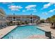 Stunning swimming pool area with comfortable lounge chairs and umbrellas, perfect for relaxation at 3792 Hitchcock Way # 213, Myrtle Beach, SC 29577