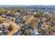 Aerial view highlighting the property's location within a lush, tree-filled neighborhood with city views at 4405 Boxwood St., Myrtle Beach, SC 29577