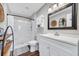 Clean bathroom featuring a shower, white vanity, and modern fixtures at 4405 Boxwood St., Myrtle Beach, SC 29577