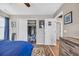 Bedroom featuring closet with sliding doors and a peek into another room at 4405 Boxwood St., Myrtle Beach, SC 29577