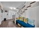 Cozy foyer with wood floors, staircase, bench seating, and decorative accents at 4405 Boxwood St., Myrtle Beach, SC 29577