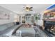 Bright living room with fireplace, shelving, and comfortable sectional sofa at 4405 Boxwood St., Myrtle Beach, SC 29577