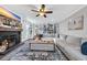 Spacious living room featuring a fireplace, built-in shelving, and comfortable seating at 4405 Boxwood St., Myrtle Beach, SC 29577