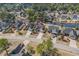 Aerial view of home in a well-manicured neighborhood with access to a pond at 4746 Harvest Dr., Myrtle Beach, SC 29579