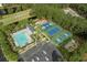 An aerial view showcasing the pool, clubhouse, playground, and sports courts amenities in a well-landscaped community at 4746 Harvest Dr., Myrtle Beach, SC 29579