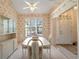 Formal dining room with ample natural light, carpet, and a classic style, perfect for gatherings at 4746 Harvest Dr., Myrtle Beach, SC 29579