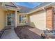 Inviting front porch area with detailed columns and space for outdoor seating, enhancing the entrance at 4746 Harvest Dr., Myrtle Beach, SC 29579