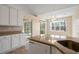 Well-equipped kitchen featuring granite countertops, a sink, and modern appliances at 4746 Harvest Dr., Myrtle Beach, SC 29579