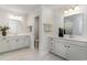 Elegant bathroom with double vanities, sleek mirrors, and recessed lighting for a spa-like ambiance at 543 Slaty Dr., Myrtle Beach, SC 29588