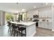 Modern open-concept kitchen with white cabinets, quartz countertops, and a large island at 543 Slaty Dr., Myrtle Beach, SC 29588