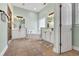 Bathroom featuring a soaking tub, double vanities, and modern fixtures at 5508 Leatherleaf Dr., North Myrtle Beach, SC 29582