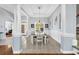 Bright and airy dining room featuring coffered ceilings, wainscoting, and a large window providing plenty of natural light at 5508 Leatherleaf Dr., North Myrtle Beach, SC 29582