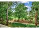 Peaceful backyard with lush greenery and trees at 5750 Oyster Catcher Dr. # 522, North Myrtle Beach, SC 29582