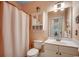Bathroom featuring a large mirror and a shower/tub combination at 5750 Oyster Catcher Dr. # 522, North Myrtle Beach, SC 29582