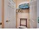 Organized closet with shelving and hanging space at 5750 Oyster Catcher Dr. # 522, North Myrtle Beach, SC 29582
