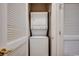 Convenient laundry closet with stacked washer and dryer at 5750 Oyster Catcher Dr. # 522, North Myrtle Beach, SC 29582