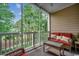 Relaxing screened porch with comfortable seating and green views at 5750 Oyster Catcher Dr. # 522, North Myrtle Beach, SC 29582