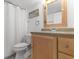 Bathroom featuring a vanity with tan countertops and neutral wood cabinetry at 607 18Th Ave. S, North Myrtle Beach, SC 29582