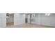 Finished basement featuring plank flooring, wainscotting, and white walls at 609 23Rd Ave. N, North Myrtle Beach, SC 29582