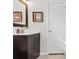 Bathroom with a vanity featuring modern fixtures and an elegant mirror at 609 23Rd Ave. N, North Myrtle Beach, SC 29582