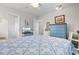 Spacious bedroom featuring a double bed, ceiling fan and hardwood floors at 609 23Rd Ave. N, North Myrtle Beach, SC 29582