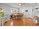 Bright dining room with wood floors and view into the kitchen at 609 23Rd Ave. N, North Myrtle Beach, SC 29582