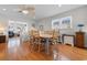 Dining space featuring hardwood floors and an open layout connected to the living area at 609 23Rd Ave. N, North Myrtle Beach, SC 29582