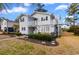 Two-story home with neatly manicured landscaping at 609 23Rd Ave. N, North Myrtle Beach, SC 29582