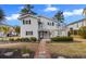 Charming exterior of home featuring a landscaped yard and inviting entryway with classic design elements at 609 23Rd Ave. N, North Myrtle Beach, SC 29582