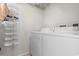 Bright laundry room featuring a white washer and dryer at 609 23Rd Ave. N, North Myrtle Beach, SC 29582