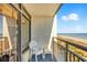 Balcony view overlooking the beach and ocean from a high-rise property at 6804 N Ocean Blvd. # 533, Myrtle Beach, SC 29572
