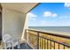 Balcony view overlooking the beach and ocean from a high-rise property at 6804 N Ocean Blvd. # 533, Myrtle Beach, SC 29572