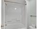 All-white bathroom with a shower-tub combo and essential fixtures and accessories at 6804 N Ocean Blvd. # 533, Myrtle Beach, SC 29572