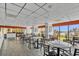 Dining area featuring tables and chairs with a beach view through large windows at 6804 N Ocean Blvd. # 533, Myrtle Beach, SC 29572