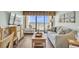 Open living room with comfortable seating and scenic ocean views at 6804 N Ocean Blvd. # 533, Myrtle Beach, SC 29572