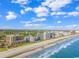 Aerial view of beachfront buildings and sandy beaches, with stunning ocean and skyline views at 6900 N Ocean Blvd. # 837, Myrtle Beach, SC 29572