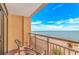 Relax on this cozy balcony with chairs and enjoy the stunning ocean view at 6900 N Ocean Blvd. # 837, Myrtle Beach, SC 29572