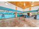 Hotel lobby with turquoise accents, tile flooring, and several seating areas at 6900 N Ocean Blvd. # 837, Myrtle Beach, SC 29572