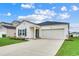 Charming single-Gathering home featuring a two-car garage, beautiful yard and manicured landscaping at 694 Harrison Mill St., Myrtle Beach, SC 29579