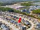 Wide aerial view of a neighborhood with the subject property marked by a red arrow at 726 Carolina Farms Blvd., Myrtle Beach, SC 29579