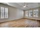 Large bedroom with hardwood floors, a ceiling fan, and lots of natural light at 726 Carolina Farms Blvd., Myrtle Beach, SC 29579