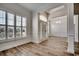 Inviting entryway with hardwood floors, decorative wainscoting, and natural light at 726 Carolina Farms Blvd., Myrtle Beach, SC 29579