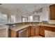 Spacious kitchen with stainless steel appliances, granite countertops, and custom cabinetry at 726 Carolina Farms Blvd., Myrtle Beach, SC 29579